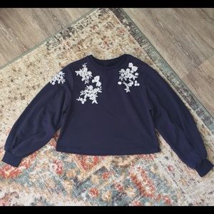 Navy crewneck sweatshirt with bell sleeve and embroidery